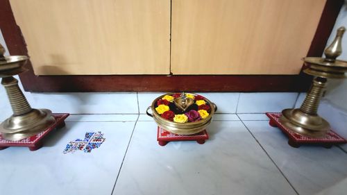 Customer photo review of Lotus Rangoli Wooden Stand / Hridaya Kamalam Kolam Manai / For Lamps / Deities/ Decoration- 6 Inches