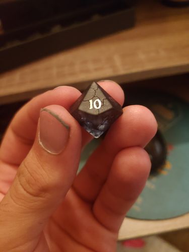 Customer photo review of Raised Dark Blue Lightning Glass Cracked Glass DnD Dice Set Dragon Dice