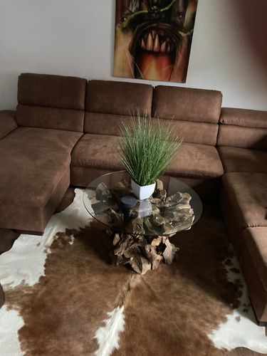 Customer photo review of Handgearbeiteter Couchtisch Ikal aus Wurzelholz inkl. Glasscheibe Ø 80 cm