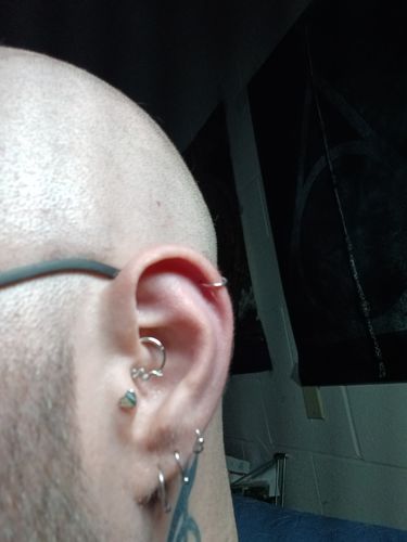 Customer photo review of Rainbow Stripe Heart Internally Threaded Lip Ring