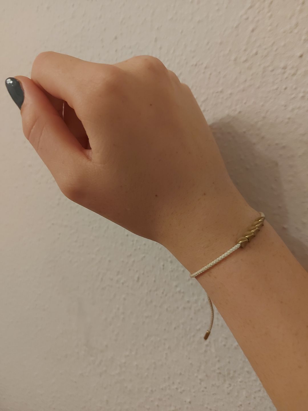 Customer photo review of Handgemachtes Tibetanisches Buddhisten Glücks-Armband aus Kupfer Modell 2