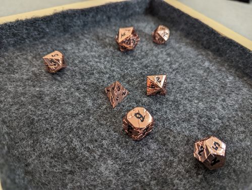 Customer photo review of Mystery Metal Dice Set