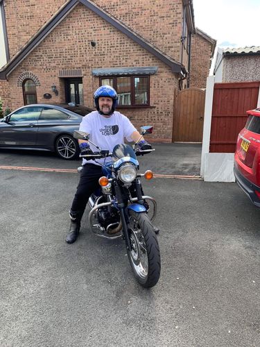 Customer photo review of The Face Down Tee
