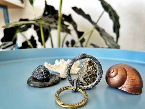 Customer photo review of Ouroboros Keychain