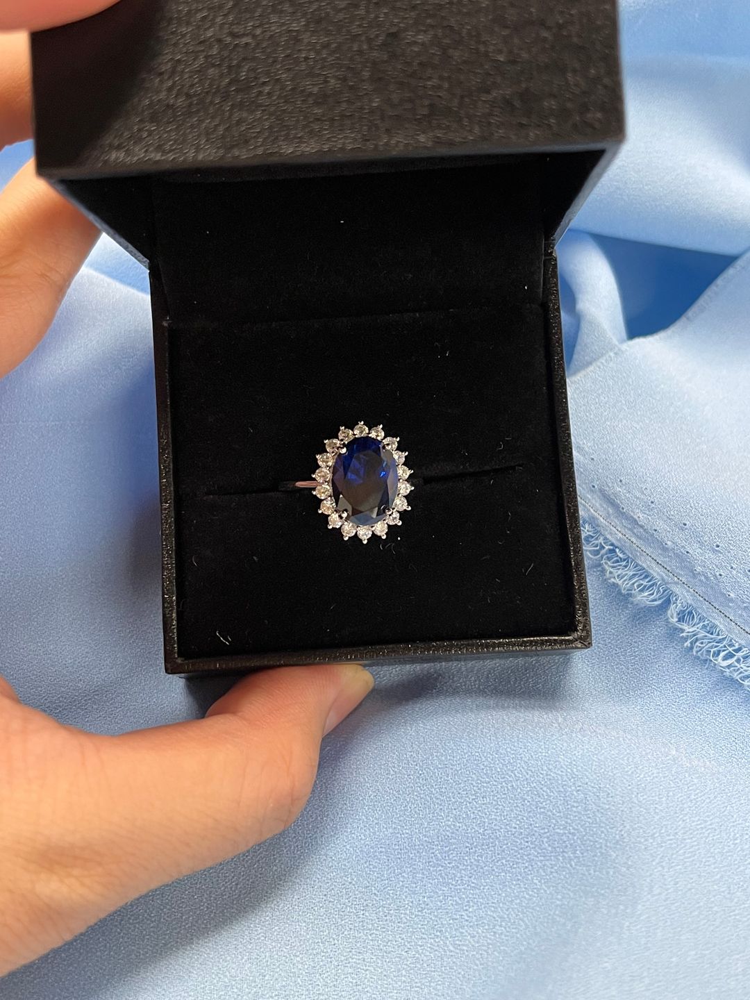 Customer photo review of 4.5 Carat Halo Oval Cut Blue/Red/Green/Yellow Sapphire Engagement Ring In Sterling Silver