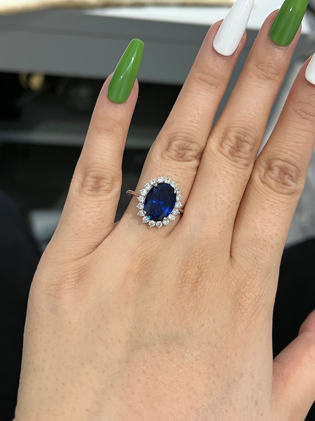 Customer photo review of 4.5 Carat Halo Oval Cut Blue/Red/Green/Yellow Sapphire Engagement Ring In Sterling Silver