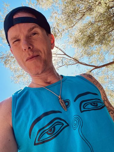 Customer photo review of Brass Rattlesnake Tail Pendant