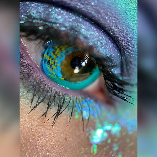 Customer photo review of Meetone Coscon Turquoise Contact Lenses
