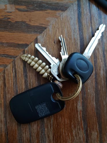 Customer photo review of Brass Rattlesnake Tail Pendant