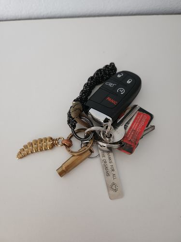 Customer photo review of Brass Rattlesnake Tail Pendant