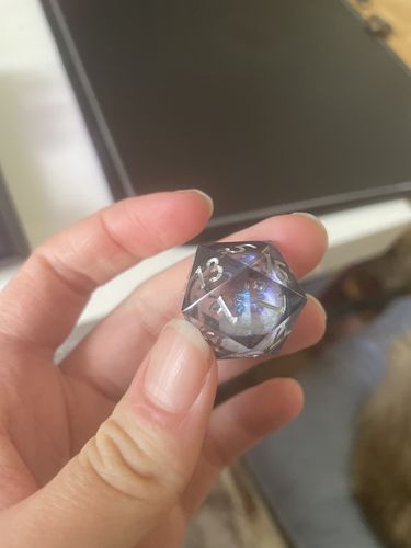 Customer photo review of Liquid Core Sharp Edge Resin DnD Dice Set Dark Blue Moon Dice