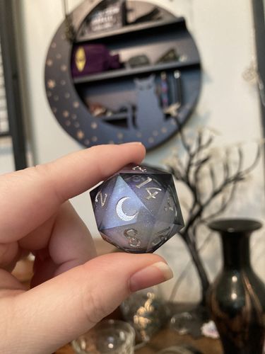 Customer photo review of Liquid Core Sharp Edge Resin DnD Dice Set Dark Blue Moon Dice
