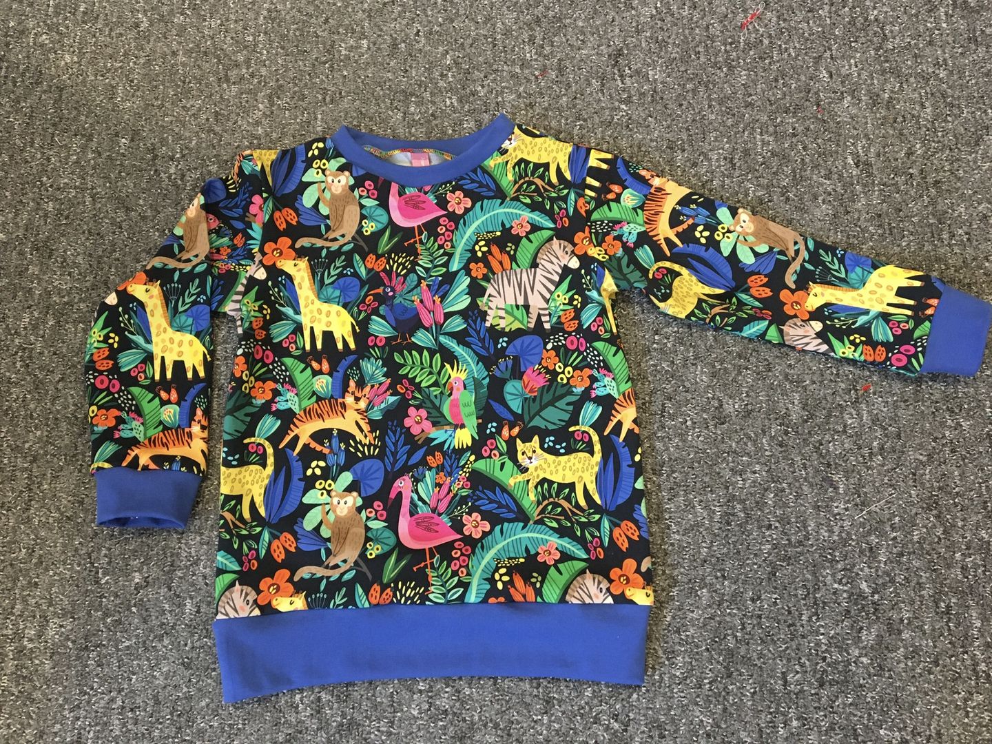 Customer photo review of Animal Jungle on Black French Terry Fabric
