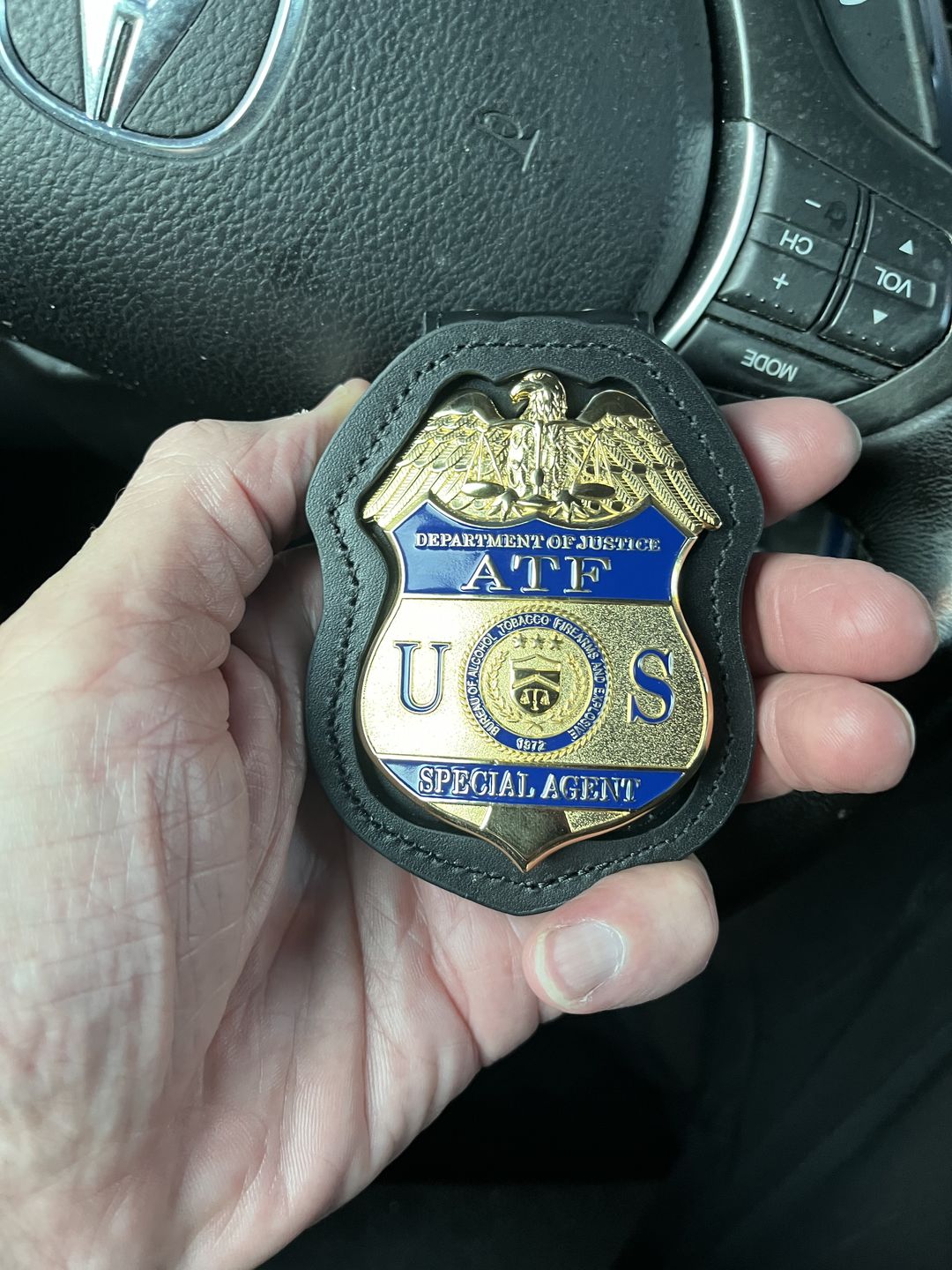 Customer photo review of US ATF Special Agent Badge Solid Copper Replica Movie Props