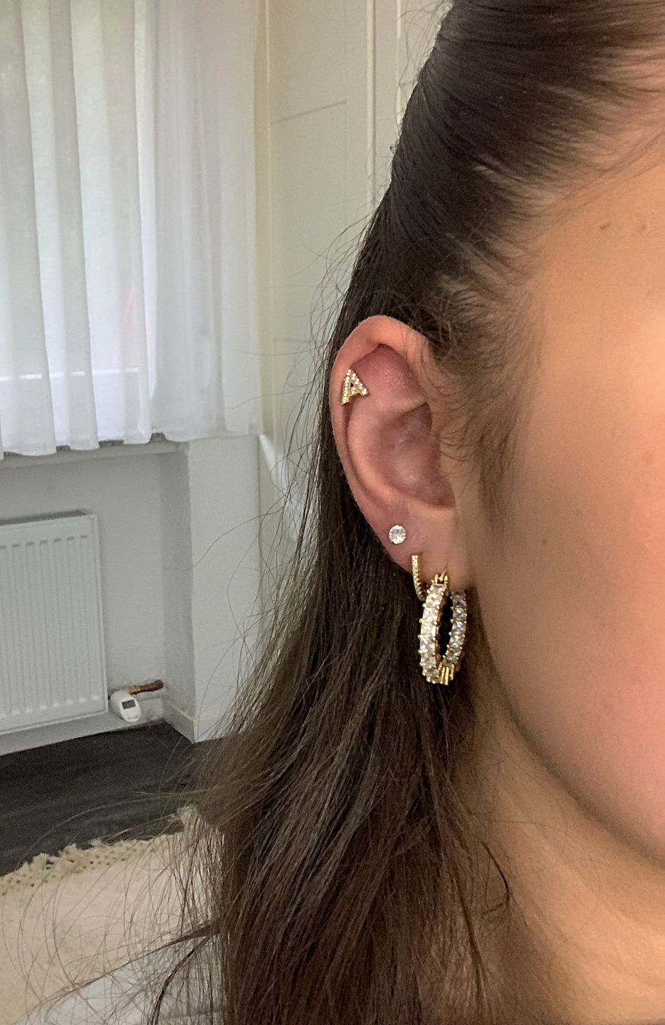 Customer photo review of Letter Piercing | Chirurgenstahl