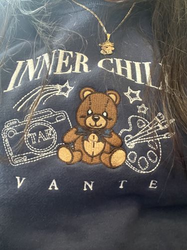 Customer photo review of Inner Child Crewneck Sweater