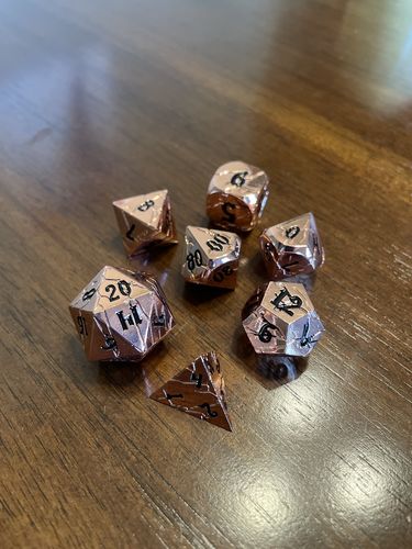 Customer photo review of Mystery Metal Dice Set