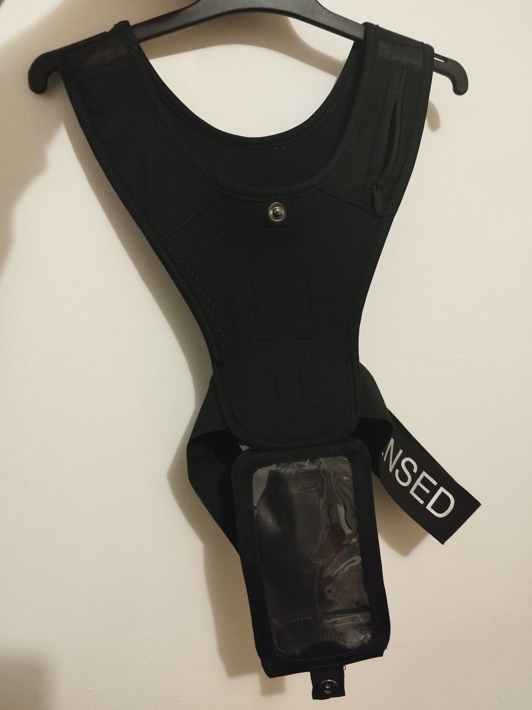 Customer photo review of Gilet STENSED de course à pied et d'entraînement avec support de téléphone.