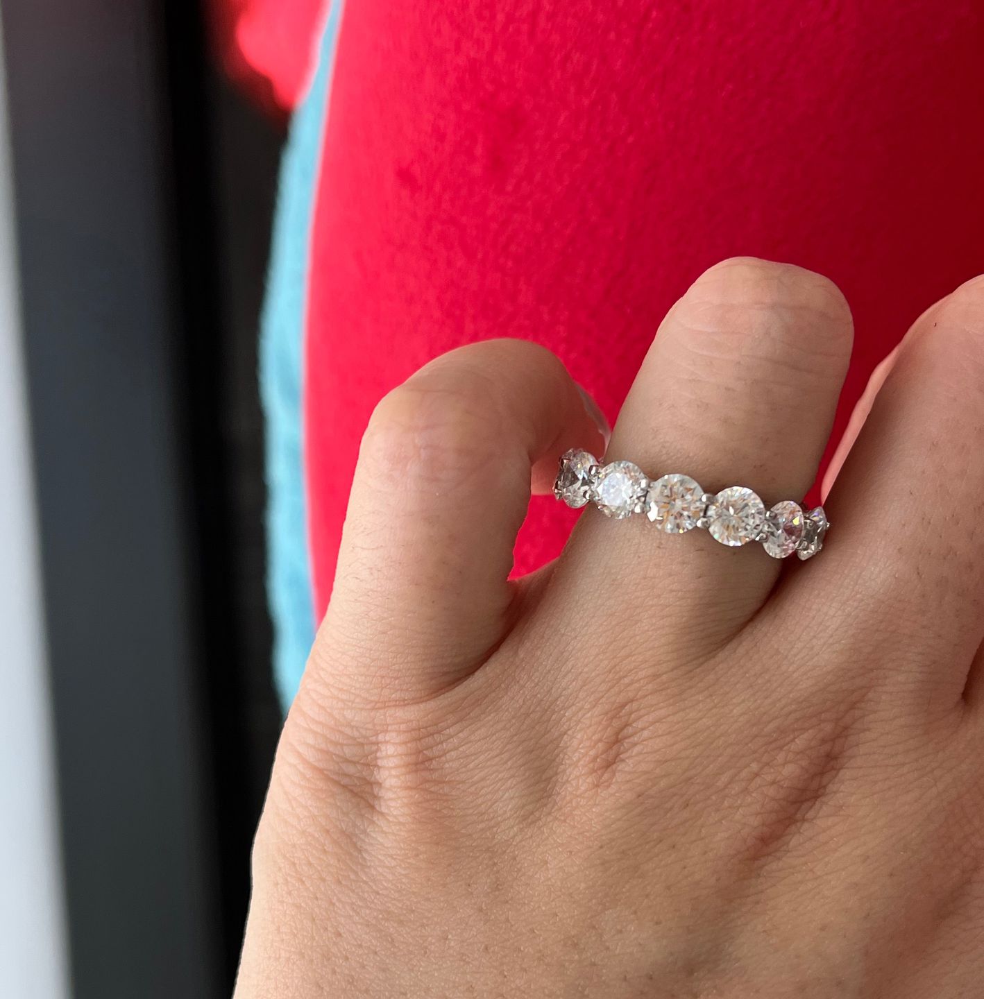 Customer photo review of Louily Classic Eternity Round Cut Women's Wedding Band In Sterling Silver
