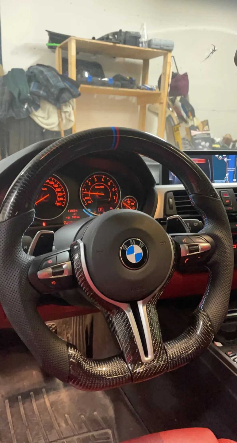 Customer photo review of BMW Facelift 09-18 Custom Carbon Fiber Steering Wheel ( FULL SET )