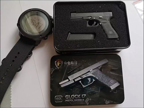 Customer photo review of Mini Glock 17 Shell Ejection Toy Keychain