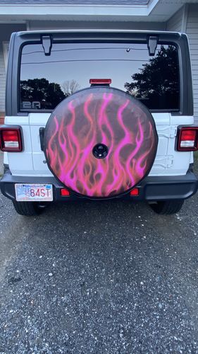 Customer photo review of Flames - Hot Pink Spare Tire Cover for Jeep, Bronco, RV, & More