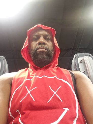 Customer photo review of Salty Savage OG Smile Sleeveless Racerback Muscle Tank Hoodie | Red