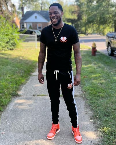 Customer photo review of Premium Side Stripe Zip Pocket Track Pants (Black - White)