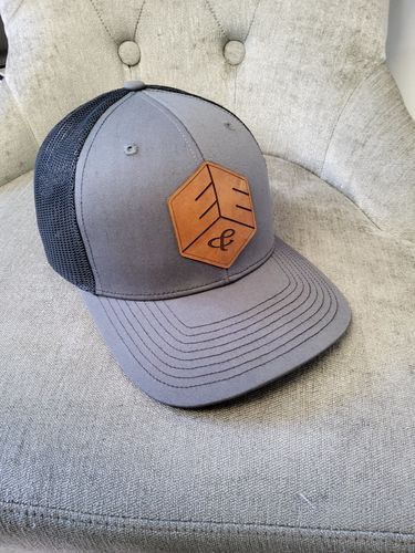 Customer photo review of Custom Leather Patch Trucker Hat - Richardson 112