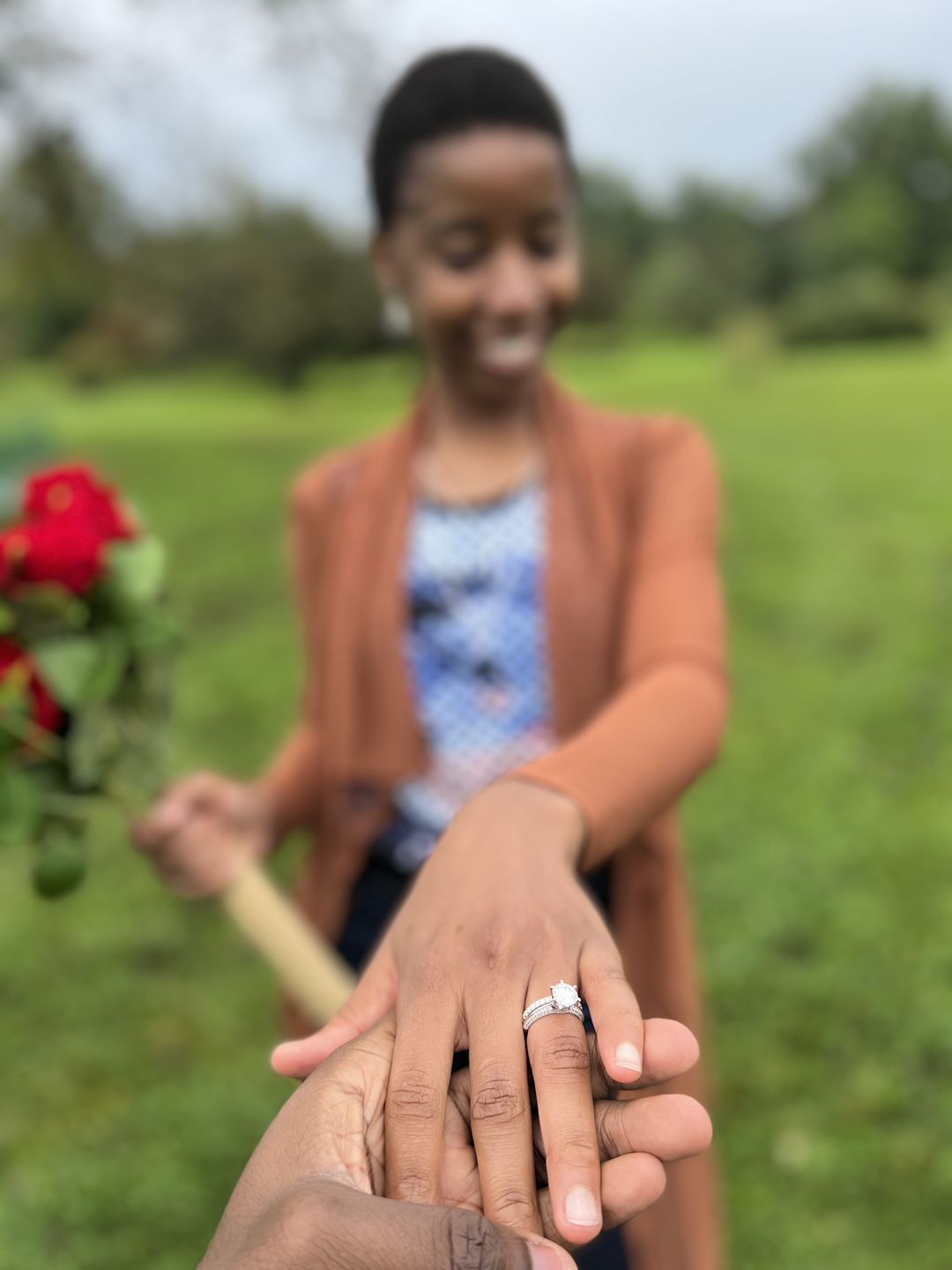 Customer photo review of Knife Edge Pave Moissanite Sterling Silver Engagement Ring