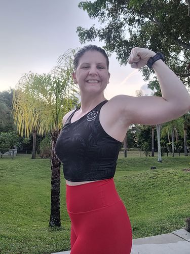 Customer photo review of Salty Savage Ladies OG Smile Tropical Shimmer Racerback Sports Bra | Black/Silver Shimmer