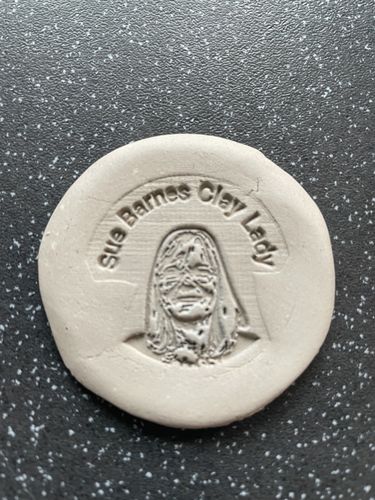 Customer photo review of Wooden Handle Face Stamp