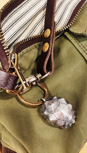 Customer photo review of Silver Tortoise Bell Pendant
