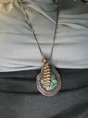 Customer photo review of Brass Rattlesnake Tail Pendant