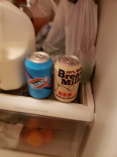 Customer photo review of "Breast Milk" Beersy Silicone Sleeve Hide-a-Beer Can Cooler