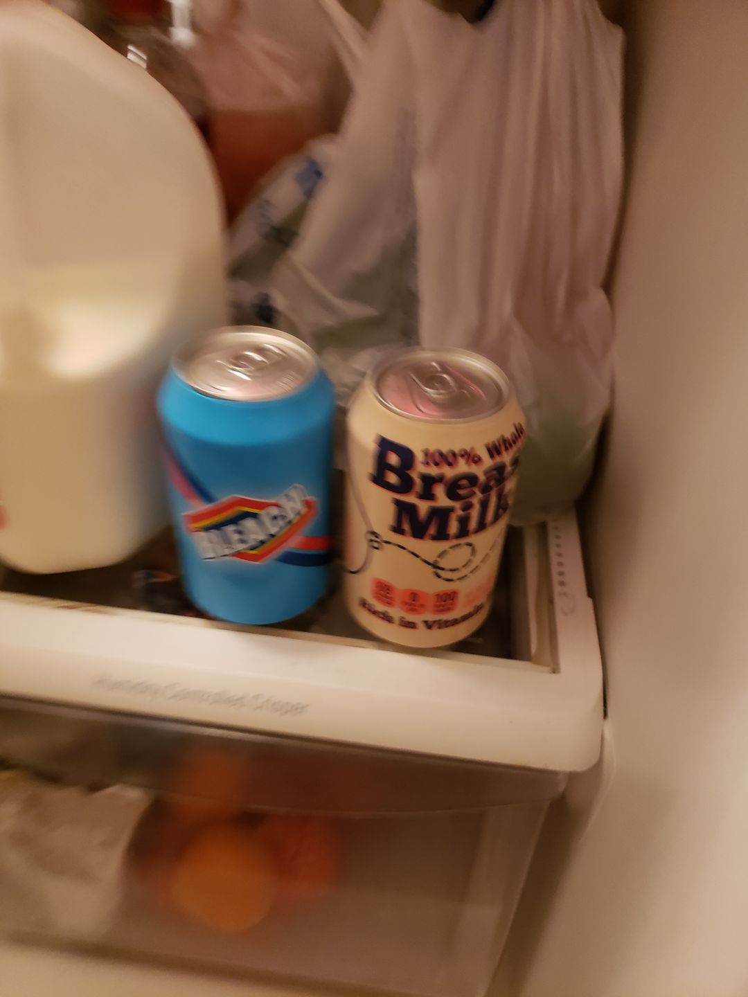 Customer photo review of "Breast Milk" Beersy Silicone Sleeve Hide-a-Beer Can Cooler