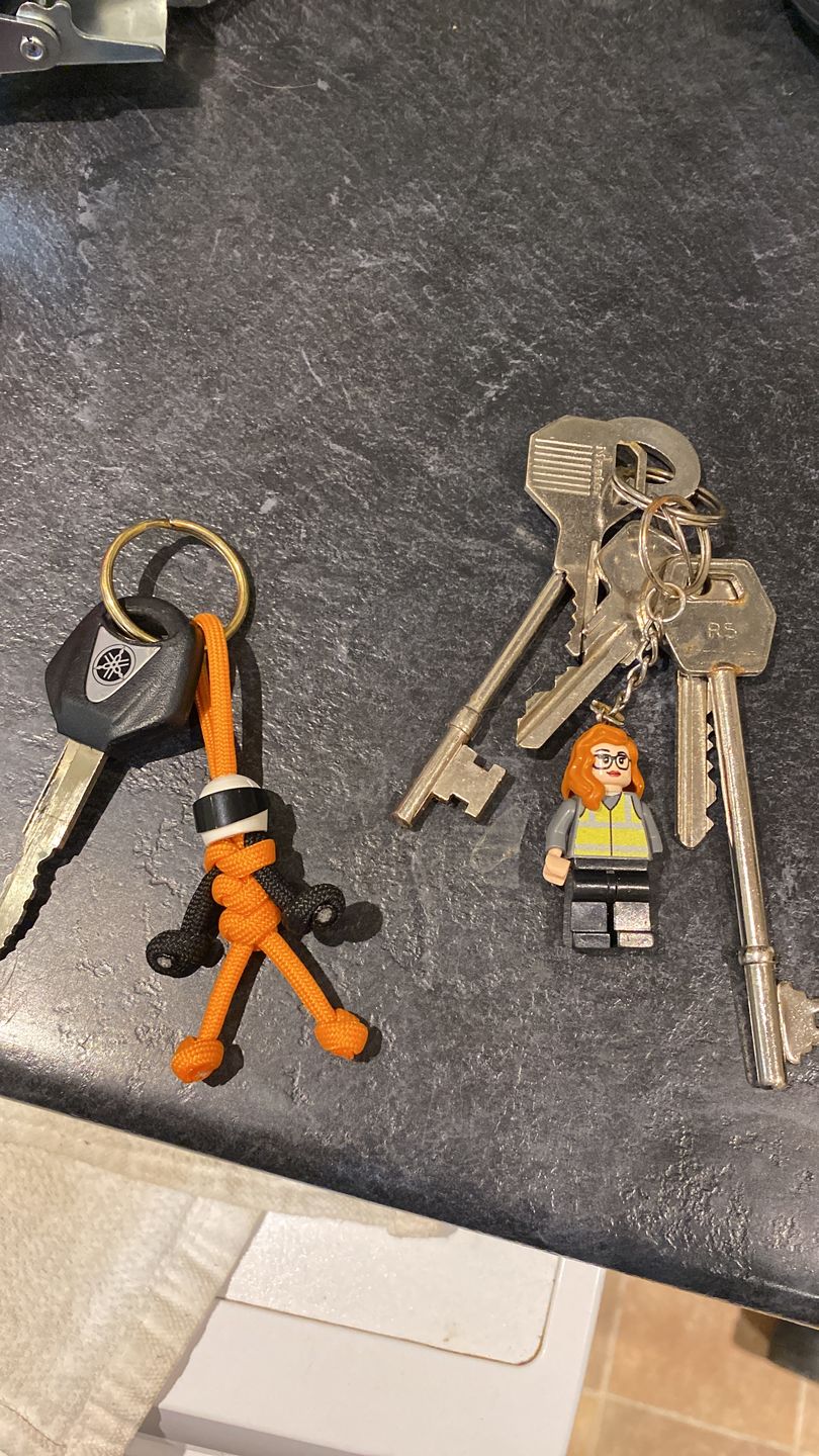 Customer photo review of Orange Biker Buddy Paracord Keychain