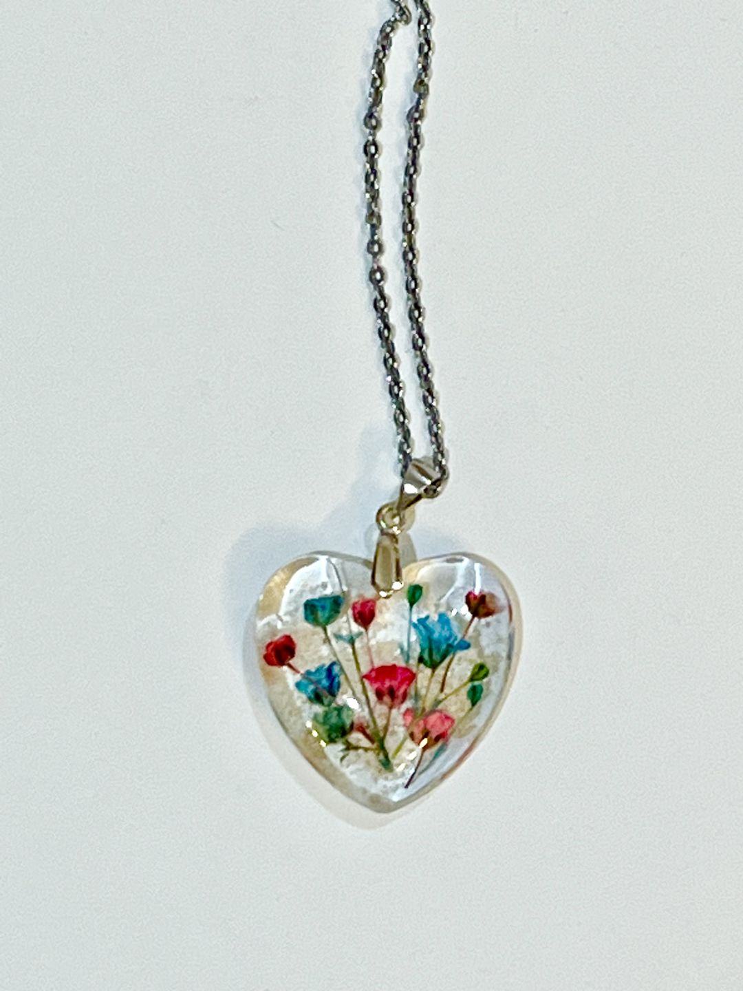 Customer photo review of Flower Heart Necklace with Real Flower and Cremains