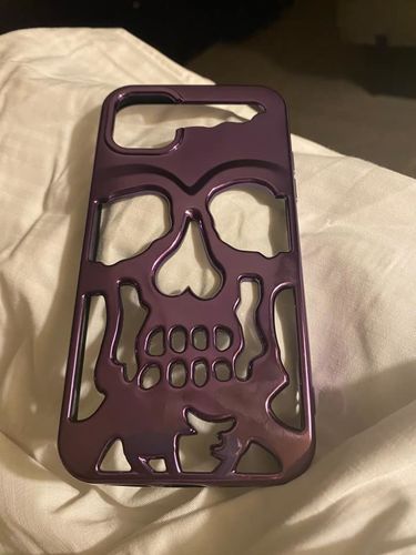 Customer photo review of Just Love Skulls Hollow Phone Case