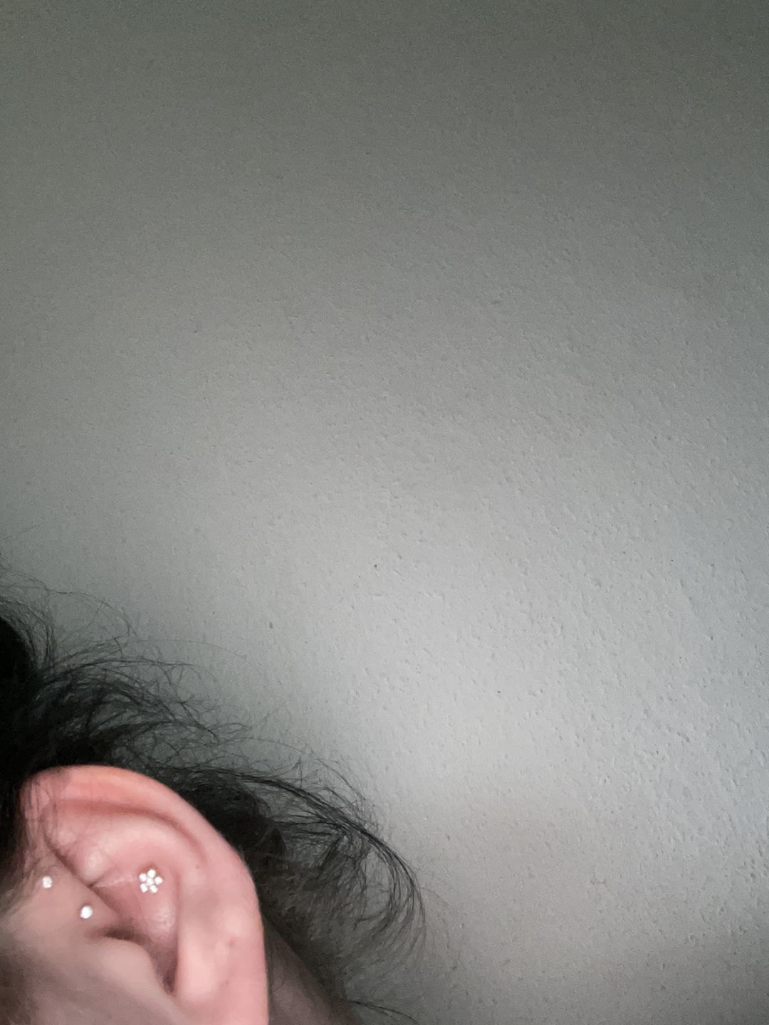 Customer photo review of Flower Piercing | Titan