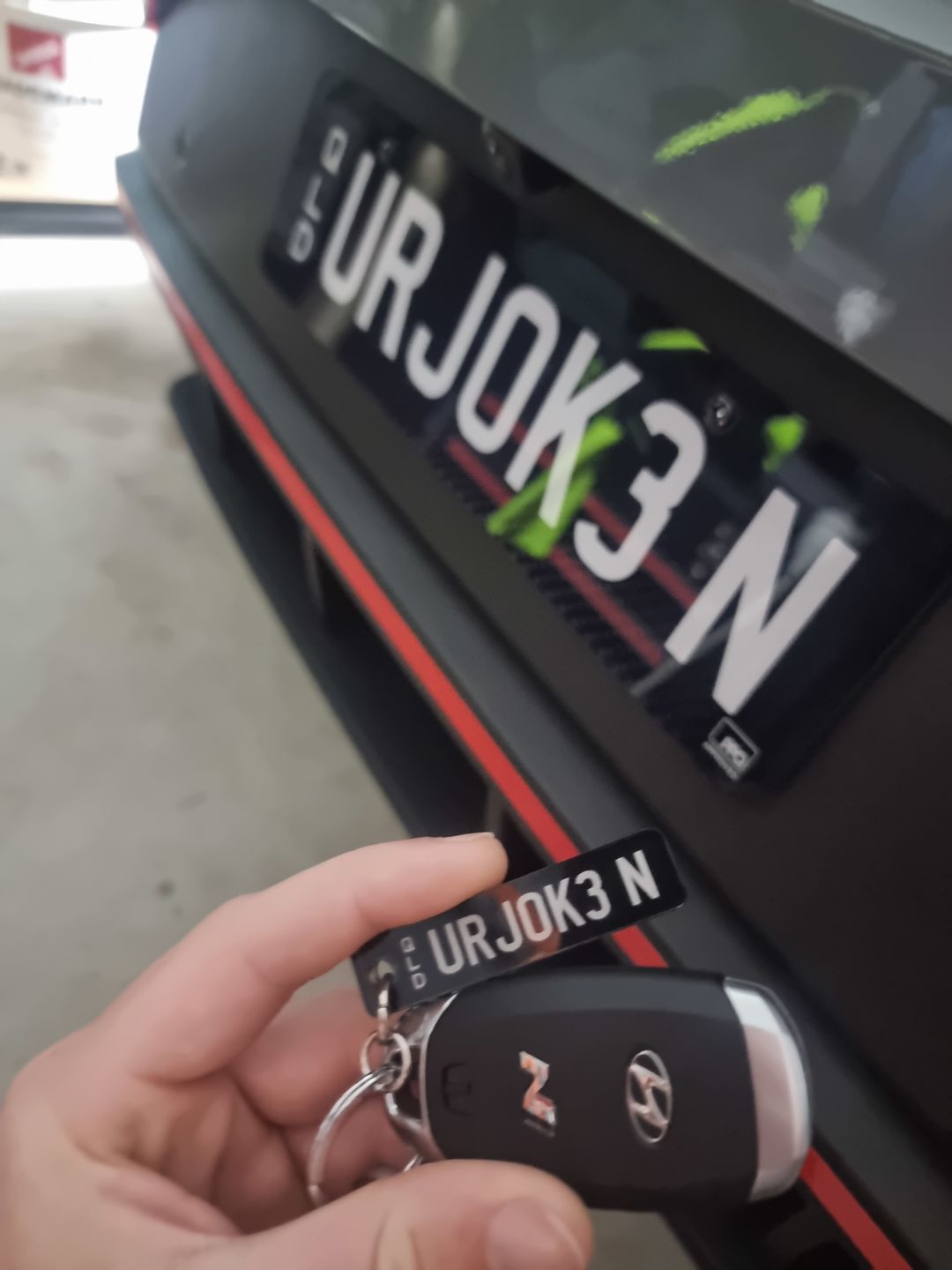 Customer photo review of QLD Prestige Licence Plate Custom Keychain