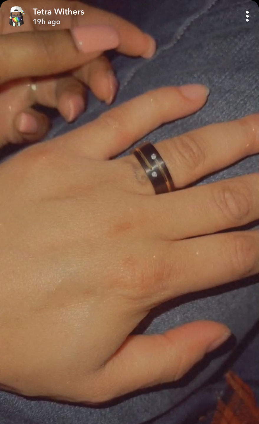 Customer photo review of Mens Black Tungsten Carbide Wedding Band with Gold Grooves 2 CZ Diamonds.