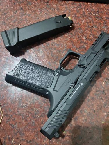 Customer photo review of Glock Auto Shell Ejection Blowback Laser Toy
