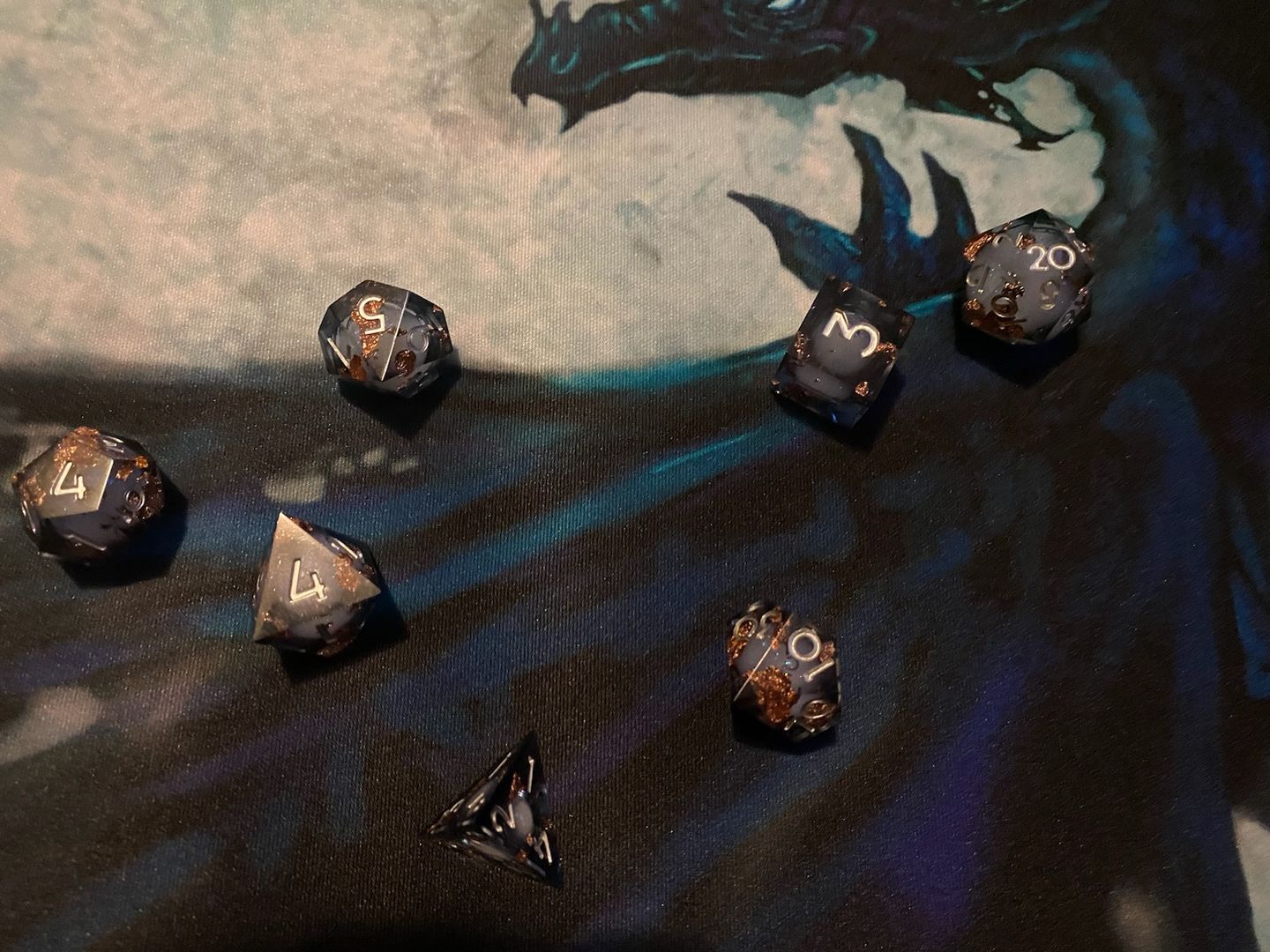 Customer photo review of URWizards D&D Starry Liquid Heart Resin Engraved Dice Set Copper Flakes
