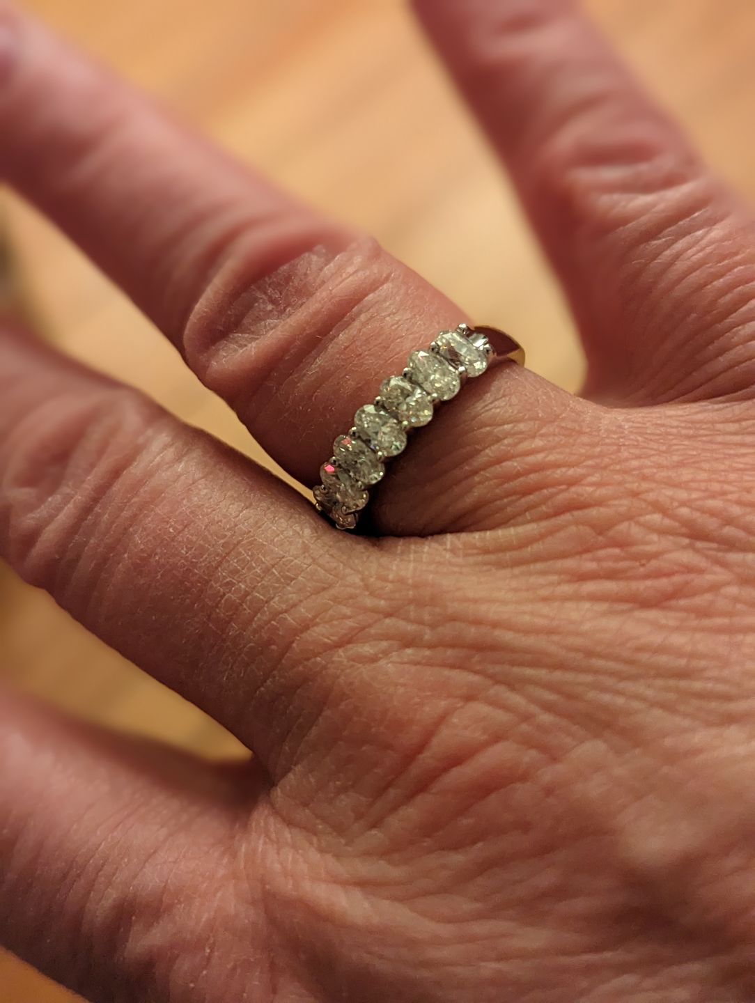 Customer photo review of Seven Stone Oval Cut Moissanite Half Eternity Wedding Band Ring