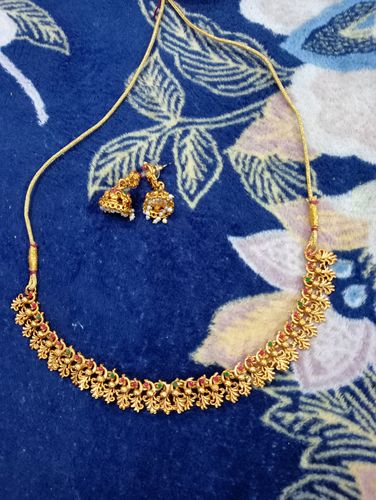 Customer photo review of Rubans 22K Gold-Plated Red & Green Stone Studded Handcrafted Traditional Temple Jewellery Set