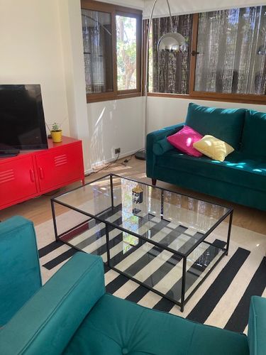 Customer photo review of Mesa de centro Rectangular 120 NEGRA dos niveles GLASS