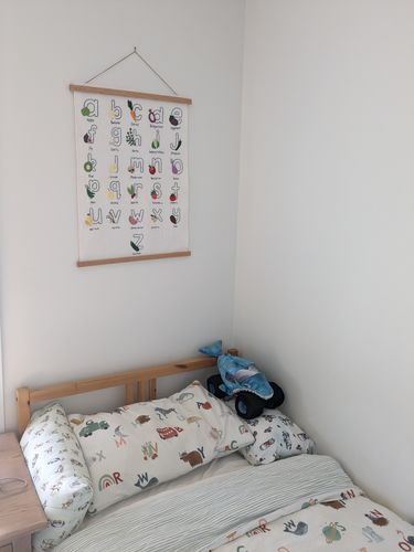 Customer photo review of Oak Poster Hanger (2 Sizes Available)
