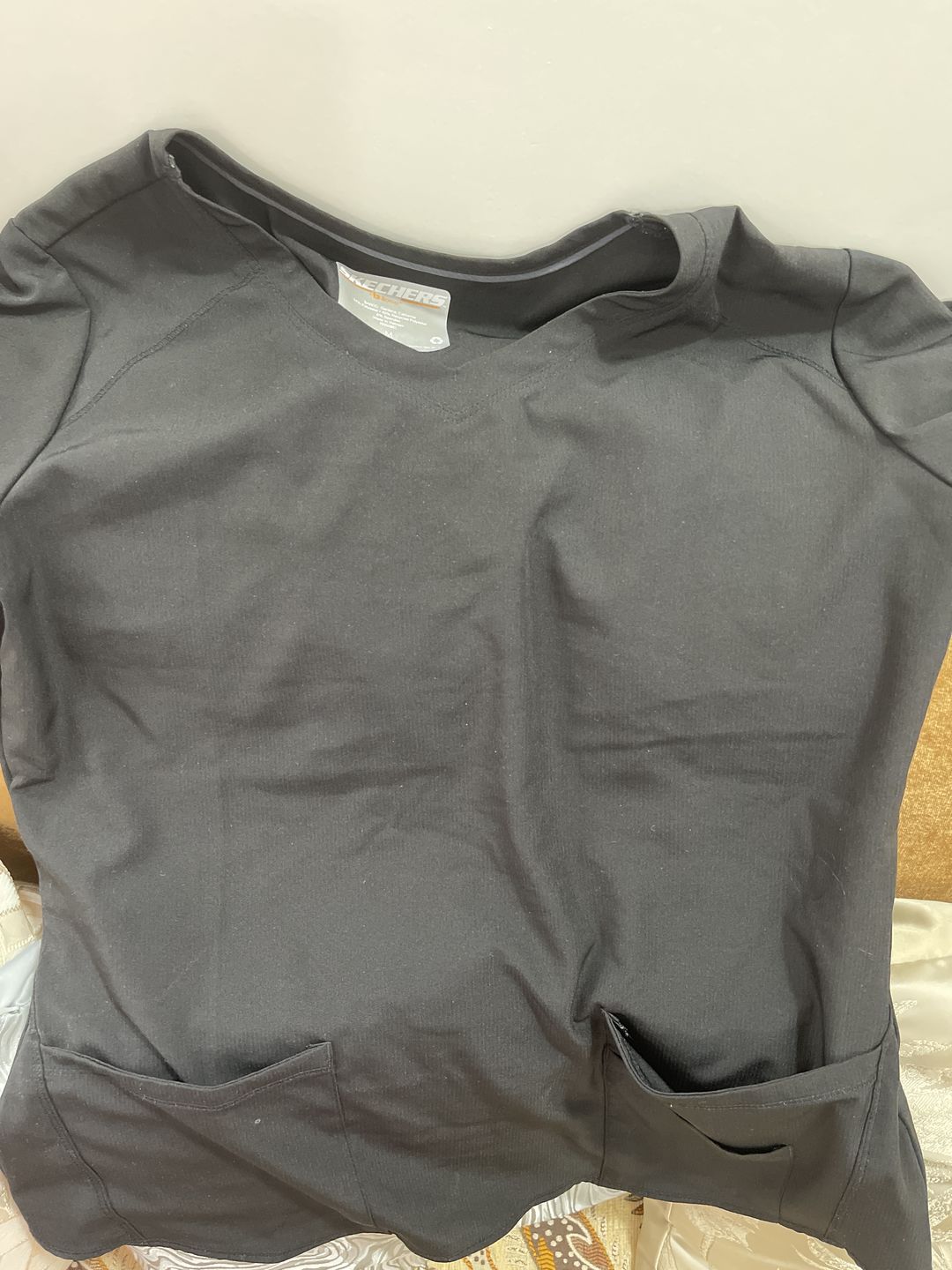 Customer photo review of بلوزة بريز سكيتشرز ~ Breeze Top Skechers