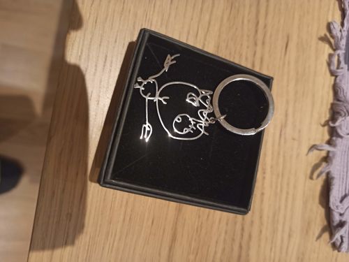 Customer photo review of LOANYA Children's Drawing As A Necklace Or Pendant